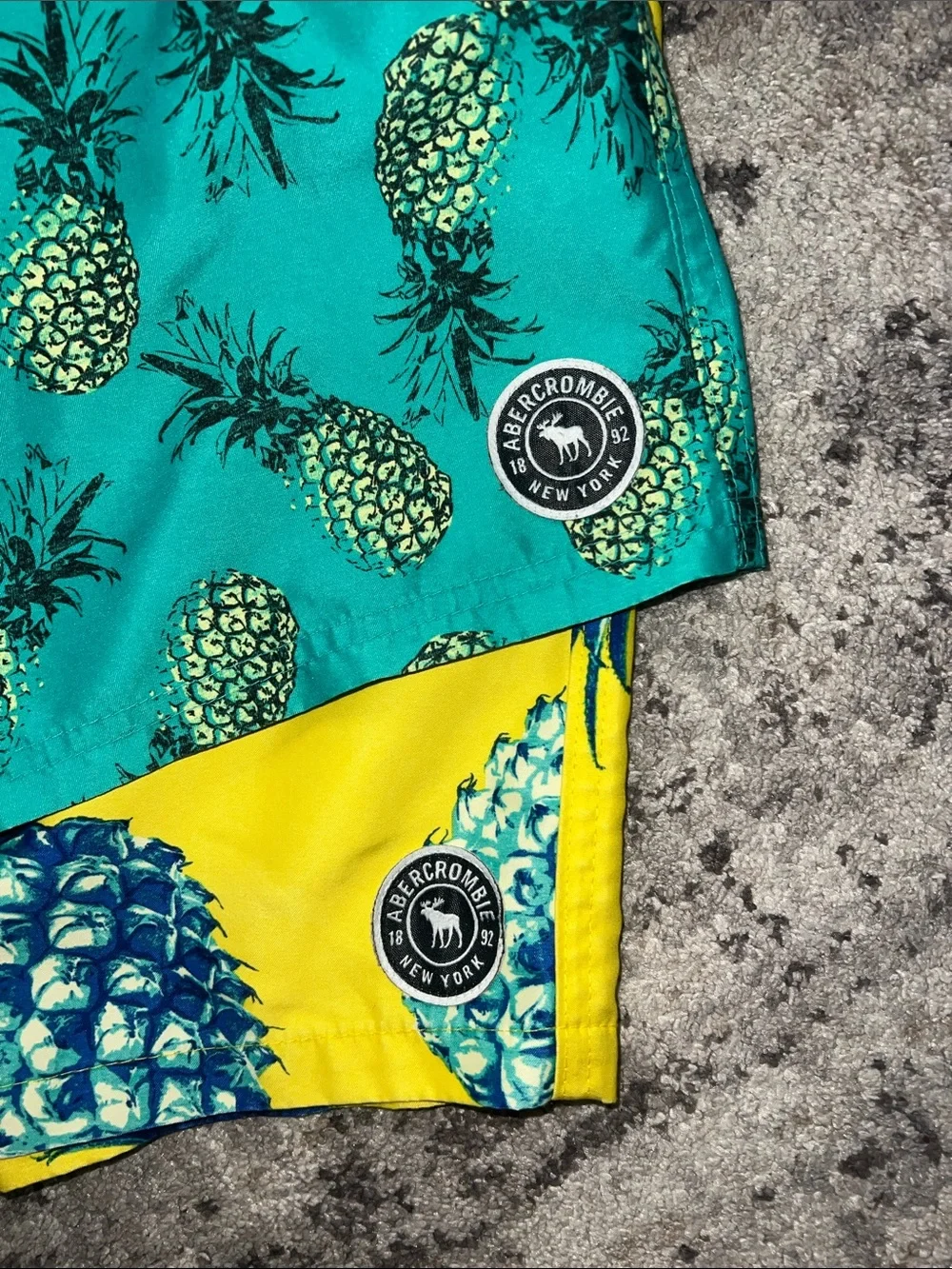 abercrombie kids Yellow & Teal Pineapple Swim Shorts. Two pair.